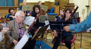 Picture of Mark Fitz-Gerald conducting participants at the Come & Play